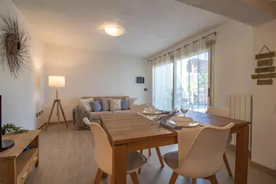 Area soggiorno di Capitana Rooms
