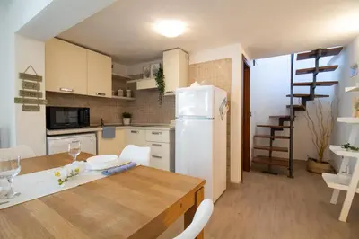 Cucina o angolo cottura di Capitana Rooms