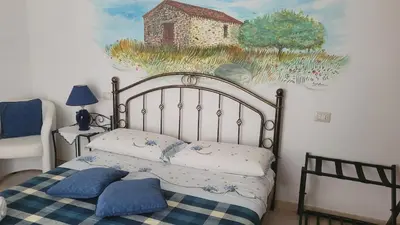 Letto o letti in una camera di Su Cunventu