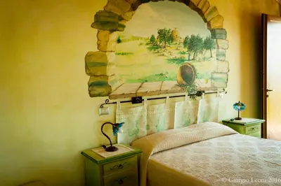 Letto o letti in una camera di Agriturismo Le Vigne Ducali