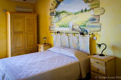 Letto o letti in una camera di Agriturismo Le Vigne Ducali