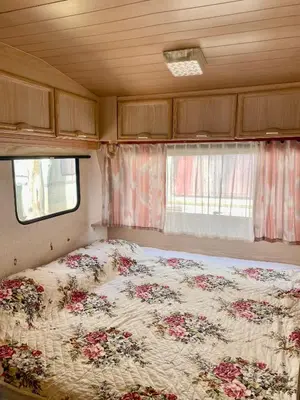 Letto o letti in una camera di Camping Cala d'Ostia