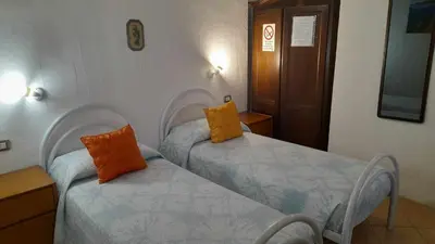 Letto o letti in una camera di B&B Gli Archi