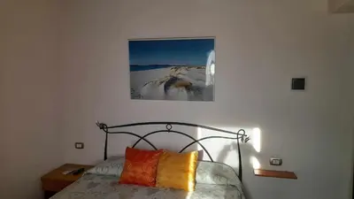 Letto o letti in una camera di B&B Gli Archi