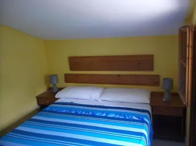 Letto o letti in una camera di Chia Zeffiro