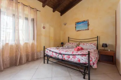Letto o letti in una camera di Affittacamere Shardana