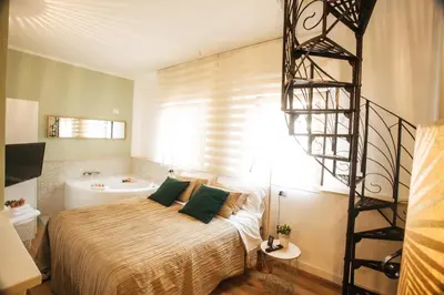 Letto o letti in una camera di Stampace Apartments