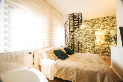 Letto o letti in una camera di Stampace Apartments