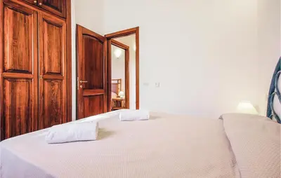 Letto o letti in una camera di 3 Bedroom Nice Home In Costa Rei -Ca-