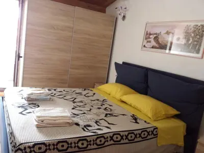 Letto o letti in una camera di Casa Zia Mariolina