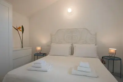 Letto o letti in una camera di Sul Mare Sardegna Villa Eudora