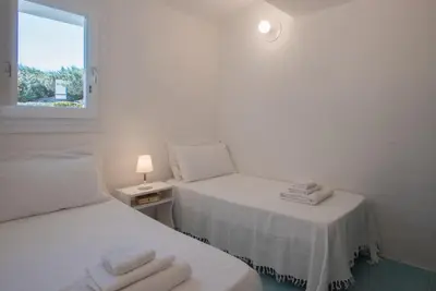 Letto o letti in una camera di Sul Mare Sardegna Villa Eunice