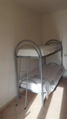 Letto o letti in una camera di Casa Vacanze Capoterra