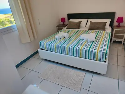 Letto o letti in una camera di Casa Vacanze Miranda