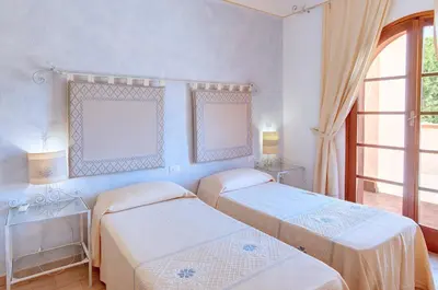 Letto o letti in una camera di Le Residenze di Piazza Italia