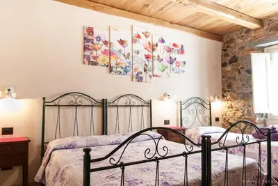 Letto o letti in una camera di Cuccumiao