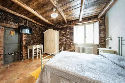 Letto o letti in una camera di Cuccumiao