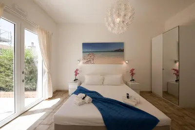 Letto o letti in una camera di Coru e Mari