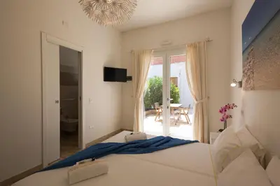 Letto o letti in una camera di Coru e Mari