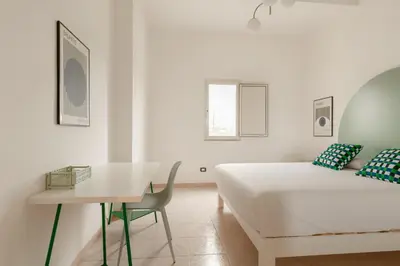 Letto o letti in una camera di Spacebility Airport - self check-in