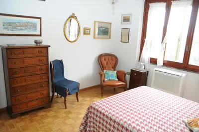 Letto o letti in una camera di Ilm Cagliari