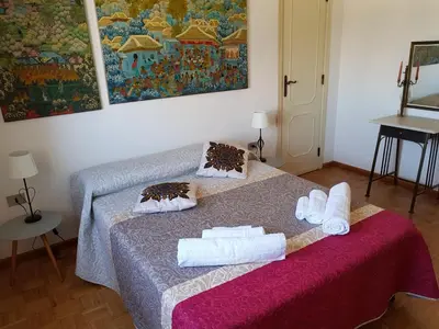 Letto o letti in una camera di Ilm Cagliari
