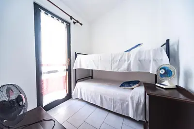 Letto o letti in una camera di Casa Le Tuie