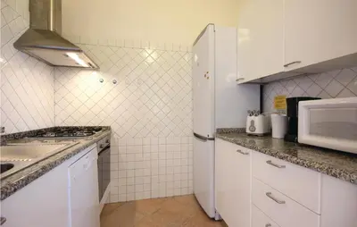 Cucina o angolo cottura di Cozy Home In Costa Rei -Ca- With Wifi