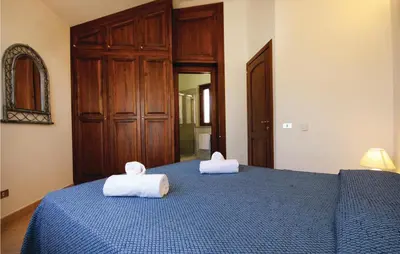 Letto o letti in una camera di Cozy Home In Costa Rei -Ca- With Wifi