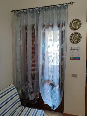 Letto o letti in una camera di Casa Giosa