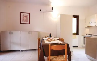 Cucina o angolo cottura di Gorgeous Apartment In Costa Rei -Ca-