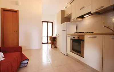 Cucina o angolo cottura di Lovely Apartment In Costa Rei -Ca-