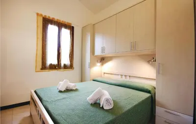 Letto o letti in una camera di Lovely Apartment In Costa Rei -Ca-