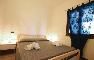 Letto o letti in una camera di Stunning Apartment In Costa Rei -Ca-