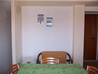 Letto o letti in una camera di Casa Vacanza Marina di Arbus