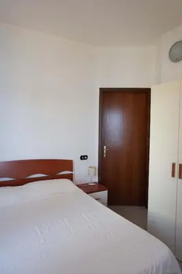 Letto o letti in una camera di Gutturu de Flumini