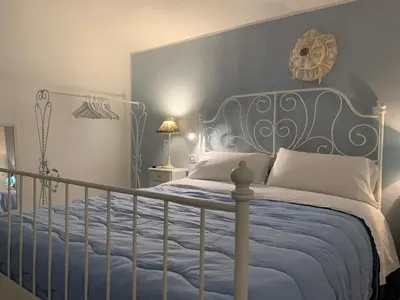 Letto o letti in una camera di AGRIB&B Il Pomo d'oro
