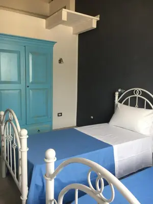 Letto o letti in una camera di AGRIB&B Il Pomo d'oro