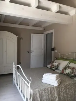 Letto o letti in una camera di AGRIB&B Il Pomo d'oro