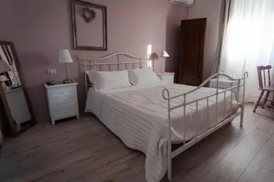 Letto o letti in una camera di AGRIB&B Il Pomo d'oro