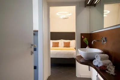 Letto o letti in una camera di Foyer Rooms Affittacamere