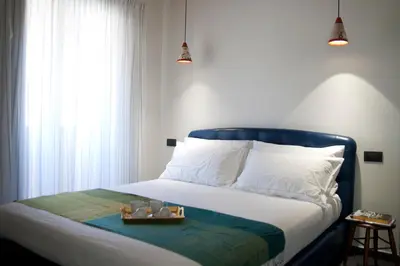 Letto o letti in una camera di Foyer Rooms Affittacamere
