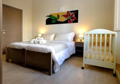 Letto o letti in una camera di EOS Room and Breakfast