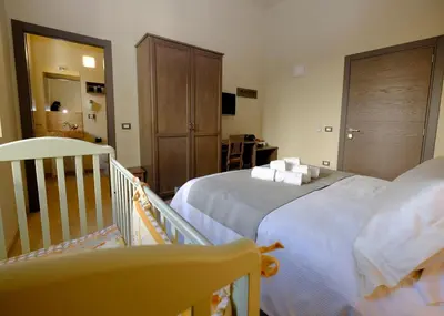 Letto o letti in una camera di EOS Room and Breakfast