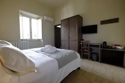 Letto o letti in una camera di EOS Room and Breakfast