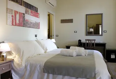 Letto o letti in una camera di EOS Room and Breakfast