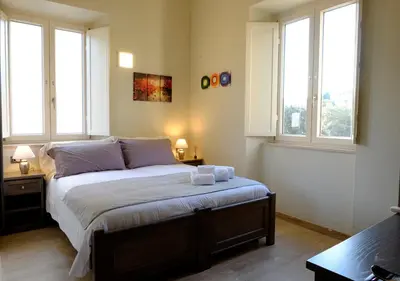 Letto o letti in una camera di EOS Room and Breakfast