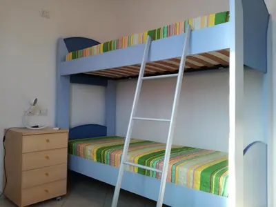 Letto o letti in una camera di Casa Letizia