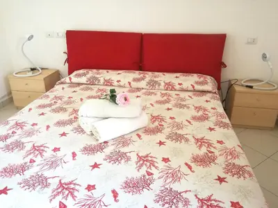 Letto o letti in una camera di Casa Letizia