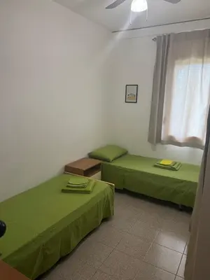 Letto o letti in una camera di Villetta Indipendente Sardegna